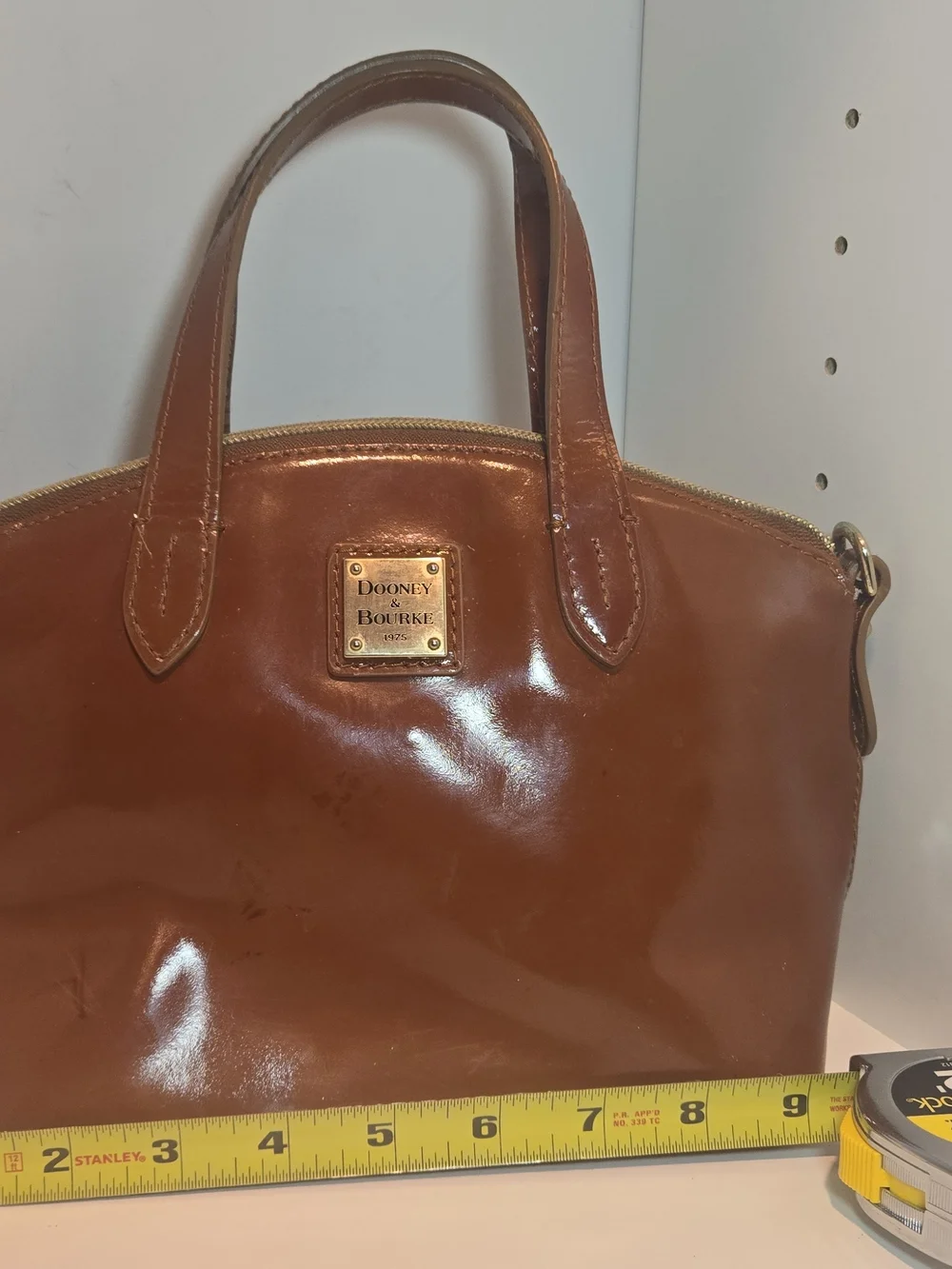 Dooney & Bourke Cognac Patent Leather Satchel with Gold Plaque